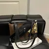 Bolsas Creativas de Retazos Primavera 2026 Bolso Tote de Gran Capacidad Diseño Elegante Bolso de Hombro Versátil Bolso de Mujer de Alta Gama