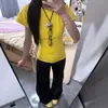 Camiseta amarilla de manga corta de algodón puro, 40 hilos, estilo simple para ir al trabajo, estilo dopamina, para mujer, top de verano ajustado que ciñe la cintura