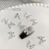 Mini mariposas de lujo para decoración de uñas, accesorios para mujer, aleación plateada retro, lazo, diamantes, novedad de 2024
