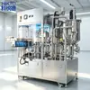 Máquina llenadora para bolsas con pico que cumple con los estándares alimentarios y farmacéuticos, con cabezal doble de flujo laminar estéril para medicina tradicional china líquida y bebidas saludables