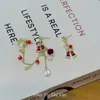 Pendientes Asimétricos de Estrella con Borla de Campana Navideña Pendientes Dulce Atmósfera Festiva Pendientes de Diseño Nicho para Mujer
