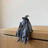 Nuevo producto transfronterizo: Adorno de figura sentada de mago, decoración creativa para el hogar, estante, librería, adorno para el borde del monitor de computadora