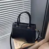 2026 Nova Bolsa Tote de Mão Transversal de Grande Capacidade Vintage de Alto Estilo Nicho para Mulheres no Trabalho