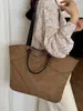 Yozzi 2026 principios de otoño nuevo estilo bolso cubo inspirado en Chanel con correa ancha para el hombro, bolsa de cordón acolchada, bolso de hombro y cruzado de moda