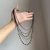 Collar apilado con borla de cuentas negras retro europeo y americano, diseño de nicho, elegante, estiloso, exquisito, único para mujer