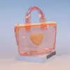 Nuevo Mini Monedero Transparente Color Gelatina Forma de Corazón Portatarjetas Creativo Bolsa para Guardar Auriculares Bolsa de Regalo al por Mayor