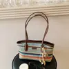 Bolsa Tote Versátil e Requintada Transfronteiriça Moda Verão 2026 Novo Design de Nicho Elegante de Alta Qualidade para o Dia a Dia Ombro Axila