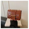 Textura casual 2026 Primavera Nova Tendência Padrão Pedra Temperamento Casual Bolsa de Ombro Único Transversal Bolsa de Axila Feminina