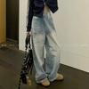 Pantalones de mezclilla azul claro desgastados estilo americano 2024 nuevo viento perezoso para parejas nicho todo partido