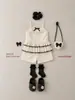 Ropa Infantil en Stock 26 Verano Nuevo Estilo Niñas Pequeñas Estilo Coreano Lunares Encaje Tira Volantes Conjunto de Shorts Conjunto de Dos Piezas