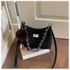 Bolsa de Axila Feminina da Moda 2026 Novo Estilo de Alta Qualidade Versátil para o Dia a Dia Bolsa de Ombro Único Bolsa Transversal Casual Simples Corrente