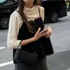 Estilo ins coreano de invierno, suave y elegante, en capas con ropa mullida, chaleco y camiseta sin mangas juveniles de imitación de lana de cordero para mujer