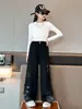 Calça Jeans Feminina Lavagem Americana Preto Tie-Dye Patch de Borboleta Outono 2025 Nova Solta Reta Perna Larga