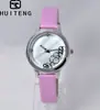 Amazon AliExpress proveedor moda reloj de mujer con esfera de concha de diamante correa morada manecillas luminosas