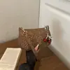 Colección de invierno 2026: bolso de hombro de estampado de leopardo de moda de este año, un bolso de hombro elegante y minimalista, un bolso pequeño cuadrado chic