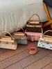 Moda Transfronteriza Versátil Gran Capacidad Primavera 2026 Nuevo Bolso de Hombro Cruzado de Moda con un Toque de Alta Gama y Bolso Cubo de Mano