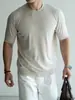 Camiseta masculina de manga curta com textura de tricô feita de seda de amoreira e lã, adequada para fitness e uso casual, com gola pequena a média, coleção outono 2026