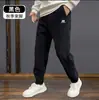 Calça Esportiva Casual Quente com Forro de Fleece Outono/Inverno, Calça Jogger Clássica Versátil de Veludo Cotelê com Caimento Solto para Homens, Adequada para Exportação e Comércio Transfronteiriço