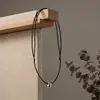 Colar Minimalista Estilo Frio Corda de Couro Preta Pingente Gota de Água Luxo Leve Nicho Corrente Lã 2024 Novas Explosões Senso Sofisticado