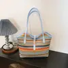 2026 Nova Bolsa de Ombro Grande de Tecido Arco-Íris Feminina Versátil para o Dia a Dia Bolsa de Palha Moda para Passeio Bolsa Tote Tendência