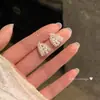 Exquisitos aretes de borla con forma de gota de agua y lazo de circón brillante para mujer, aretes de lujo ligero de alta gama, accesorios extremadamente hermosos y elegantes