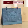 Calendario 2027 Estilo Chino Estampado en Caliente Calendario Mensual Adorno de Escritorio Creativo Anillado Tarjeta Perforada Planifica el Calendario de Hoy Logo Personalizado