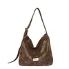 Bolsa de Ombro Único com Estampa de Leopardo Retrô Outono/Inverno 2026 Feminina Estilo Coreano Ins Bolsa Casual de Lona Bolsa Tote de Grande Capacidade