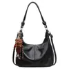 Bolso tipo dumpling de cuero suave con patrón de lichi para mujer, nuevo bolso tote vintage otoño e invierno 2026, bolso cruzado de gran capacidad para el día a día