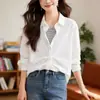 Chal de Dos Piezas Falsas Rayado Camisa Azul de Manga Larga para Mujer Diseño de Moda Primavera 2026 Top de Algodón Puro Plisado