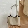 Bolsa de ombro de alta qualidade transfronteiriça, bolsa de palha tecida, nova bolsa de mão da moda estilo francês de grande capacidade, bolsa de ombro para o dia a dia