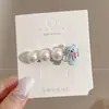 Elegante presilha frontal com design de bico de pato, presilha lateral fofa para fios soltos, pequeno grampo floral estilo Chanel, novo modelo 2026 de acessório de cabelo
