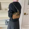 Bolso bandolera de gamuza retro versátil para mujer, bolso de axila, súper popular 2026, nuevo estilo para el trabajo