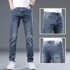 Jeans de seda de hielo azul claro de alta gama italianos para hombre, pantalones casuales de negocios rectos delgados de ajuste slim elásticos de verano