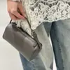 Bolsa de Almofada Simples Portátil Personalizada pelo Fabricante Bolsa de Mão Versátil na Moda Bolsa de Couro Genuíno para Canetas Transfronteiriça Atacado para Mulheres