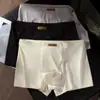 Piel de Leche Seda de Hielo Ropa Interior para Hombre Verano Fresca Transpirable Calzoncillos tipo bóxer Sin Costuras Cintura Media Color Sólido Pantalones de Cuatro Esquinas Dropshipping Artículo Caliente