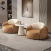 Mesa y sillas de negociación modernas de lujo ligero para sala de estar, balcón, dormitorio, salón de belleza, tienda de ropa, silla individual de cuero con diseño de garra de gato