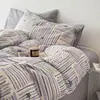Juego de cuatro piezas de algodón puro, patrón de rayas simple, juego de tres piezas para dormitorio, juego de cuatro piezas de ropa de cama de algodón para la piel, venta al por mayor y al por menor