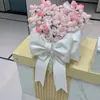 Ramo de cubo de abrazo decorado con lazo rosa, materiales DIY para decoración de dormitorio y sala de bodas, decoración de pared de fondo de Navidad
