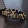 Accesorios para el cabello de pedrería de lujo ligero al por mayor resorte para el pelo de bobina de madre pasador pasador para la parte posterior de la cabeza de las mujeres clip superior de alta gama clip horizontal para coleta