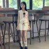 Conjunto de Dos Piezas para Niñas Verano 2026 Estilo Coreano Estilo Academia Dulce Lindo Chaleco sin Mangas con Lazo Moda Falda Plisada
