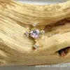 ASTMF-13 aleación de titanio colección oro morado claro aretes G23 titanio rosca interna circonita pernos para labio pernos para piercing