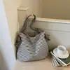 Bolsa Tote Listrada de Grande Capacidade Transfronteiriça para Mulheres 2026 Nova Versátil Bolsa de Ombro Estilo Preguiçoso Nicho Bolsa de Ombro para o Dia a Dia