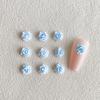 Hot novo creme Camellia nail jewelry cor sólida bolo creme resina tridimensional pequenas joias de unhas flor