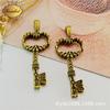 A1212 Verde Antiguo 5.2g Colgante de Llave Retro Accesorios Coreanos para Llaves Venta al por Mayor de Joyería DIY