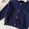 Conjunto de Otoño para Niña 2026 Nuevo Estilo Suéter de Punto Falda a Cuadros Conjunto de Dos Piezas Bebé Niña Estilo Coreano Elegante