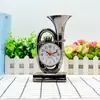 Configuración de mesa estilo europeo retro instrumento musical tamaño pequeño despertador regalo de empresa reloj venta al por mayor tienda de 10 yuanes suministro