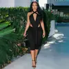 Ropa de mujer ajustada estilo europeo y americano de comercio exterior, mono elegante de color liso con cuello halter, sin tirantes, espalda descubierta, cuello en V, largo, moderno