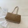 Retro estilo coreano, bolso de almohada de gamuza de nicho, nueva colección otoño 2026, color liso, moderno, gran capacidad, adecuado para ir al trabajo, y se puede llevar bajo el brazo