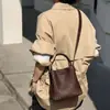 2026 Nuevo Diseño de Nicho Bolso Tejido Moda Versátil Bolso de Hombro Cruzado Bolso Cubo Bolso Casual