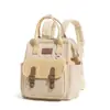 Mochila tipo tote de estilo japonés, fresca y colorida, de colores contrastantes, adecuada para estudiantes, escuela, salidas y el trayecto diario; una mochila suave y versátil para niñas pequeñas